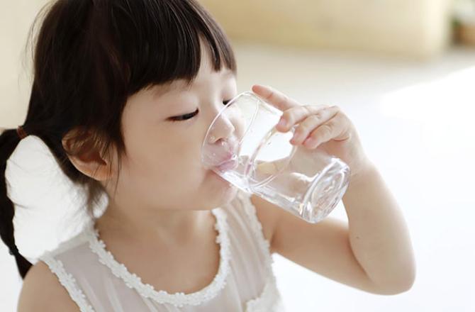 child drinking water