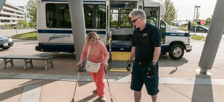 transhelp driver assisting passenger