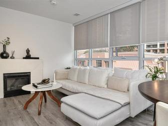 Furnished living room at 360 City Centre Drive.