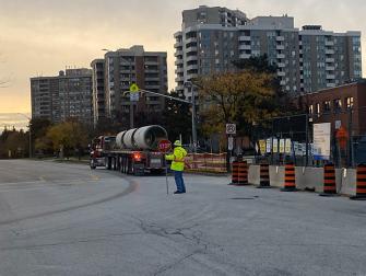Flagger along Malta Avenue