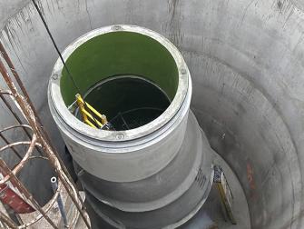 View from the top of the access point, during the installation of the maintenance hole structure