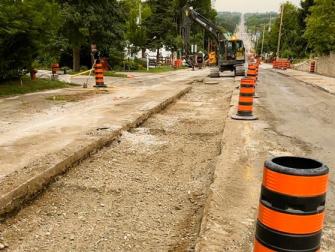 Ongoing restoration of storm sewer trenches on Airport Road.